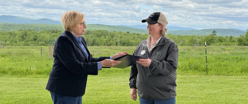 Governor Mills presents the Dairy Month 2026 proclamation to Betsy Bullard