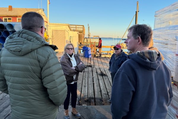 Governor Mills being briefed about storm damage in New Harbor