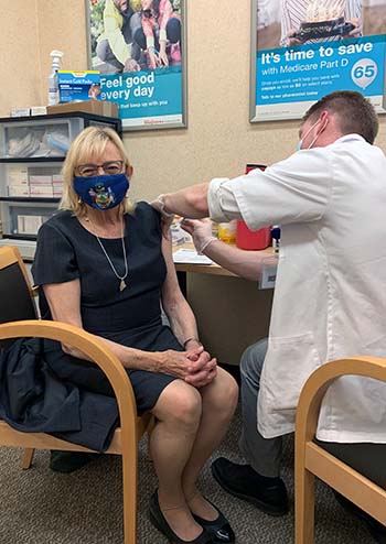 Governor Mills receiving her flu vaccine
