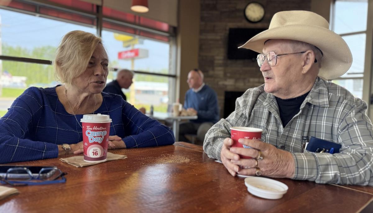 Governor Mills having coffee with Ron Turcotte