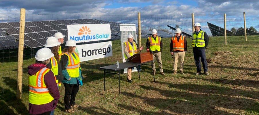 Governor Mills speaks at a community solar site in Farmingdale