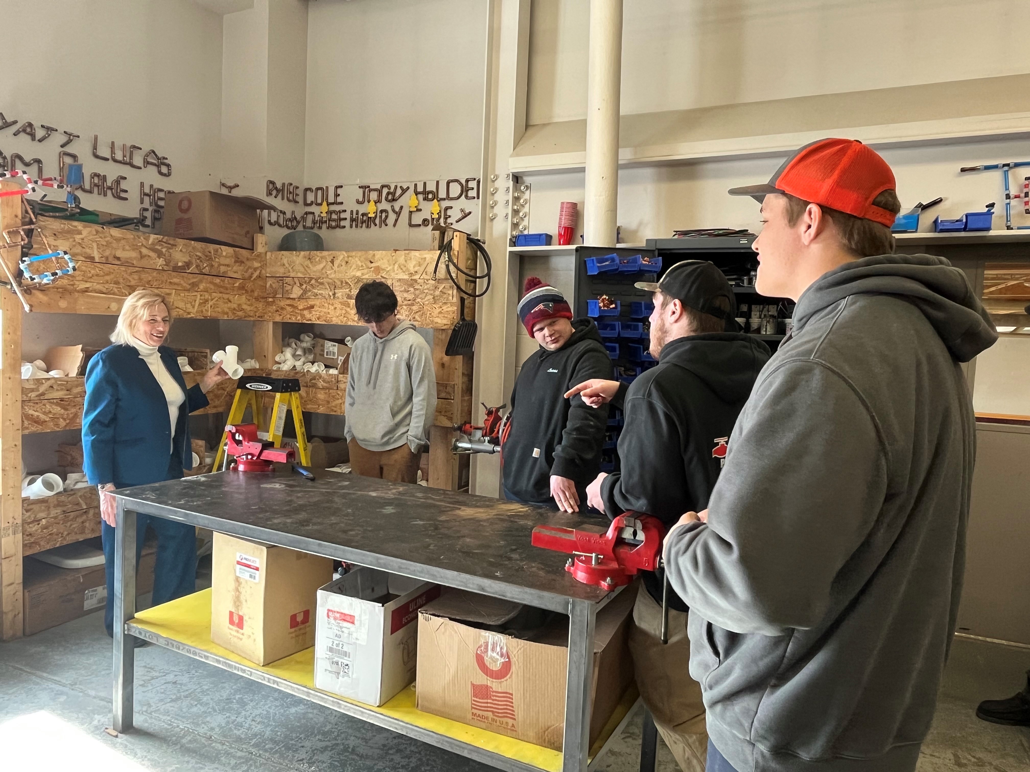 Governor Janet Mills with Oxford Hills Technical School plumbing students