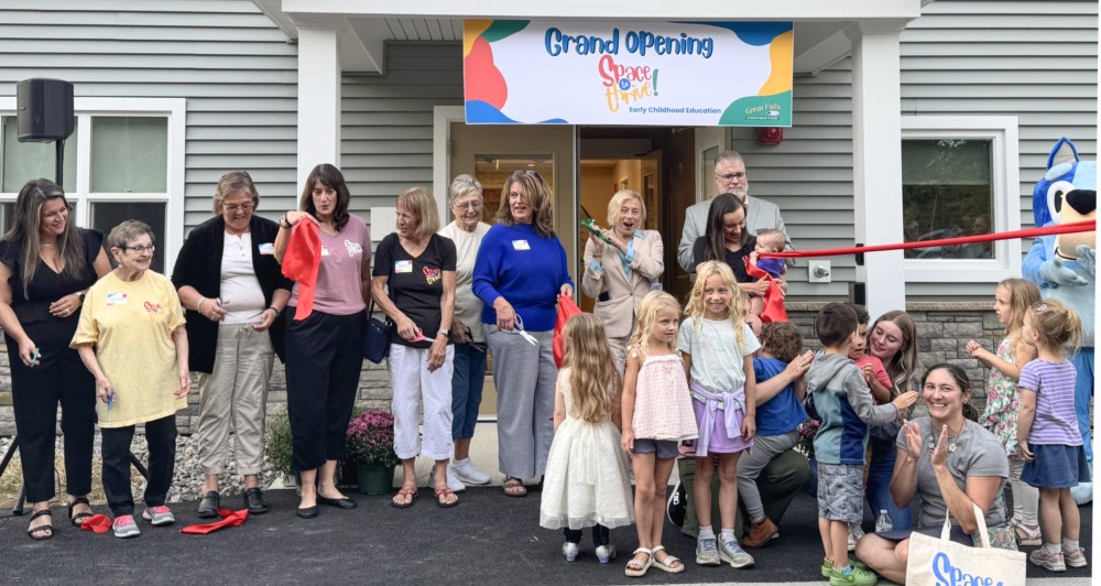 Governor Mills and a crowd of people cutting the ribbon on Windham Child Care Center Funded by Jobs Plan