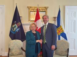 Governor Mills and Nova Scotia Premier Tim Houston shake hands