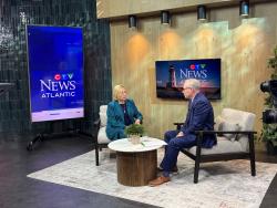 Governor Mills in the Halifax studios of CBC, CTV, and Global News