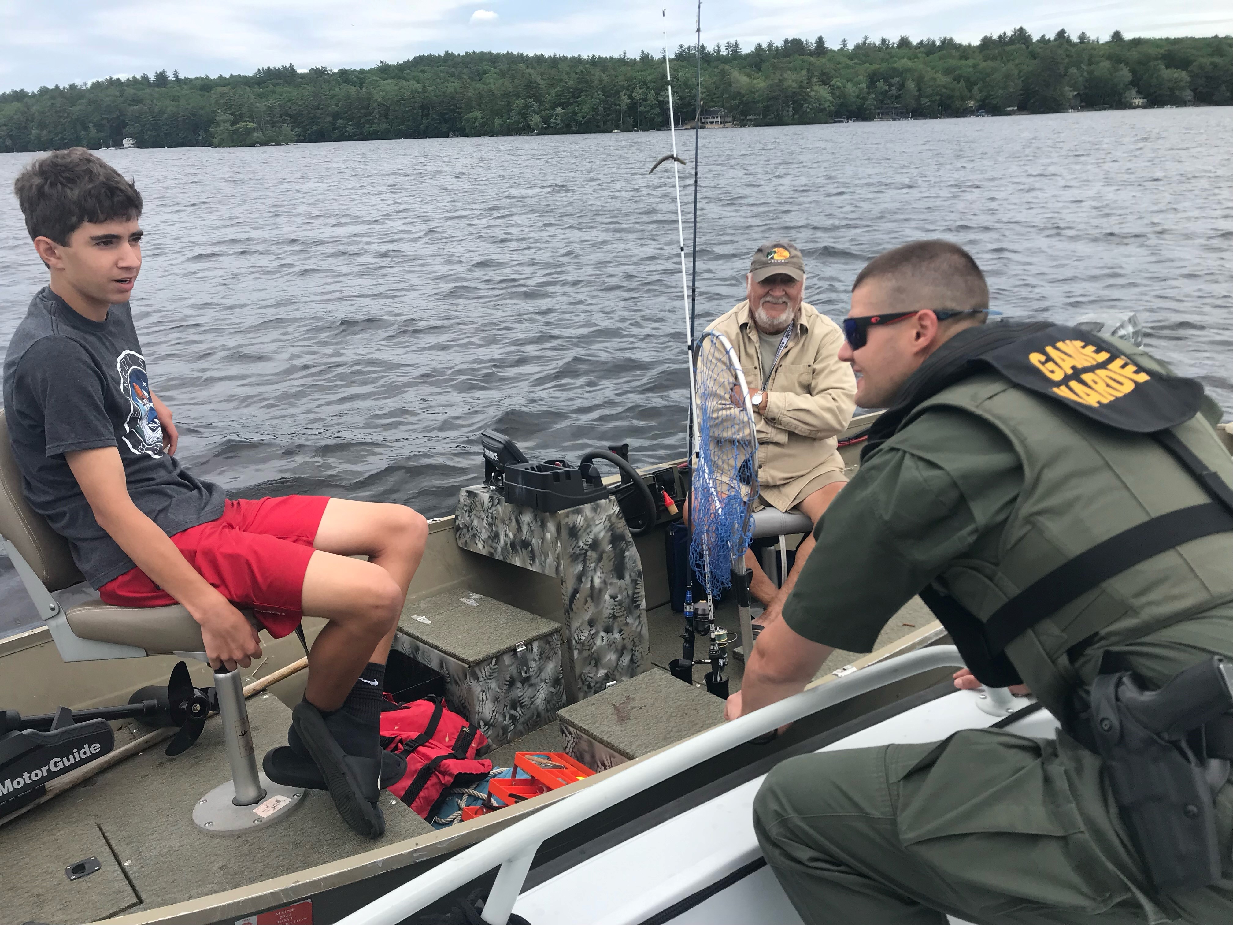 Deputy Game Warden York contacting boaters