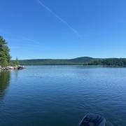large lake with bright blue skies