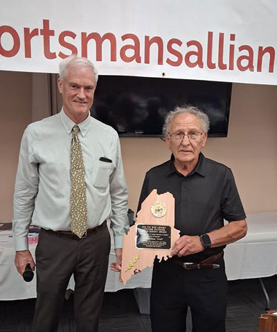 Matt Scott receiving award