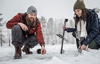 people ice fishing