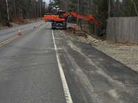 Shaping inslopes near the acadia national park entrance.