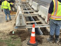 Excavating and prepping for pouring concrete around a slotted drain at The Colony in Hulls Cove.