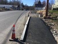 Chinked Curb and Paved Sidewalk.