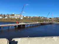 View of cofferdams for piers 3 and 4 with Edmundston, New Brunswick in the background