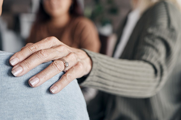 This is a graphic showing two people talking.