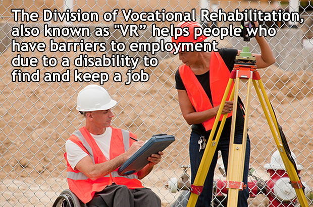 male construction worker in wheelchair consulting female worker