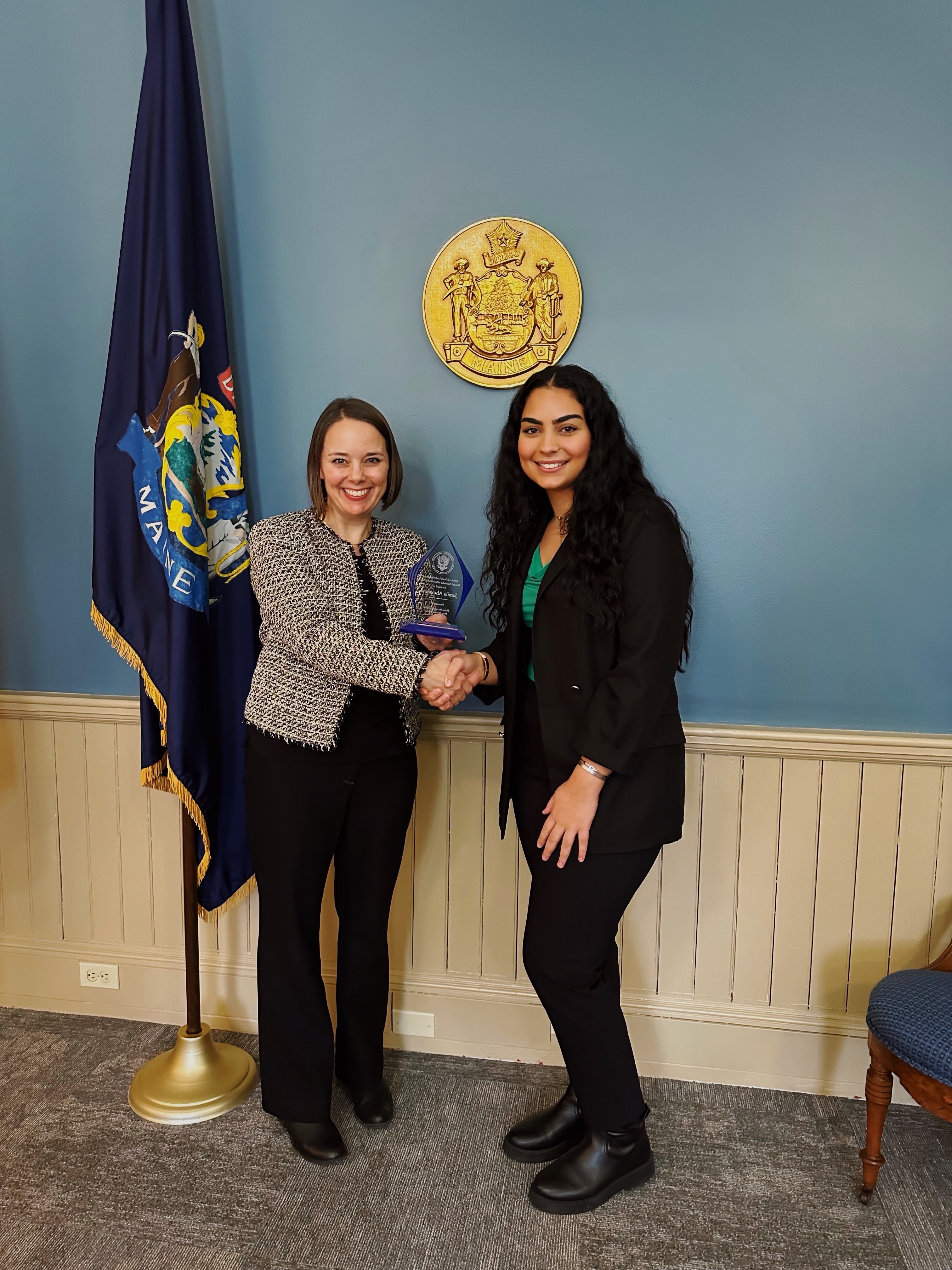 Shenna Bellows presents Jamila Ahmadova with the John Lewis Youth Leadership award.