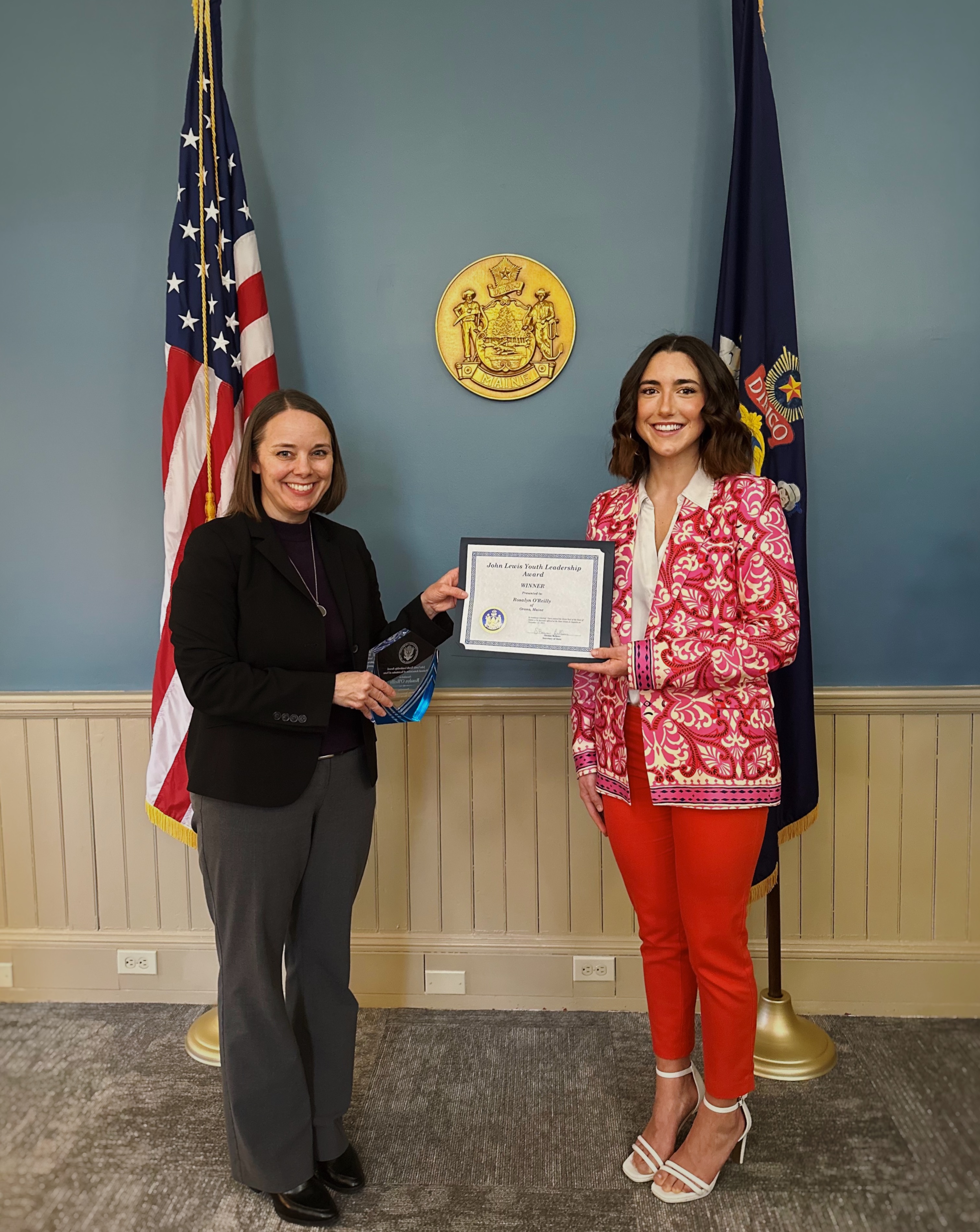Secretary of State Shenna Bellows and John Lewis Youth Leadership Award winner Rosalyn O'Reilly.