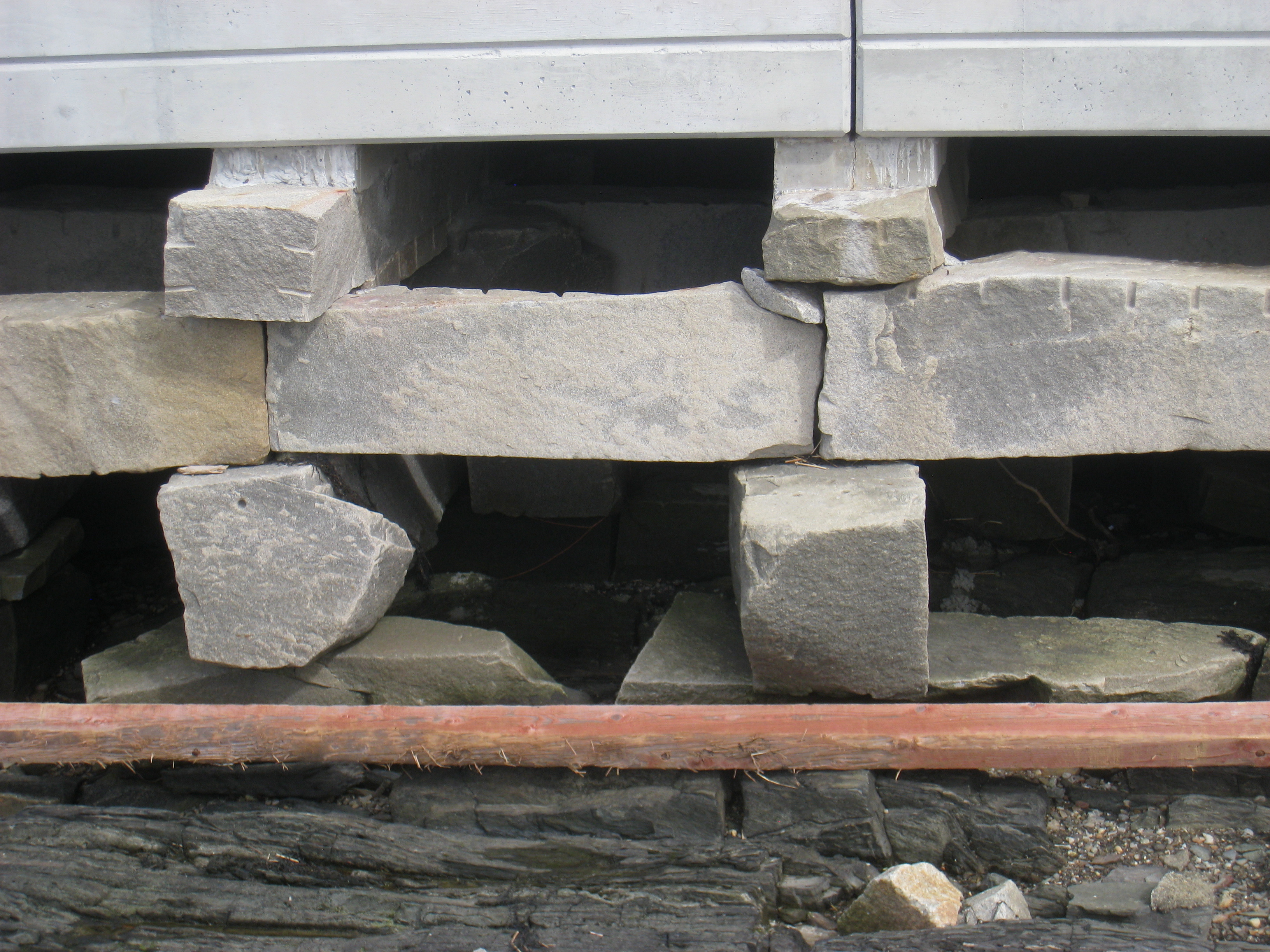 Close up of concrete bricks supporting an old bridge