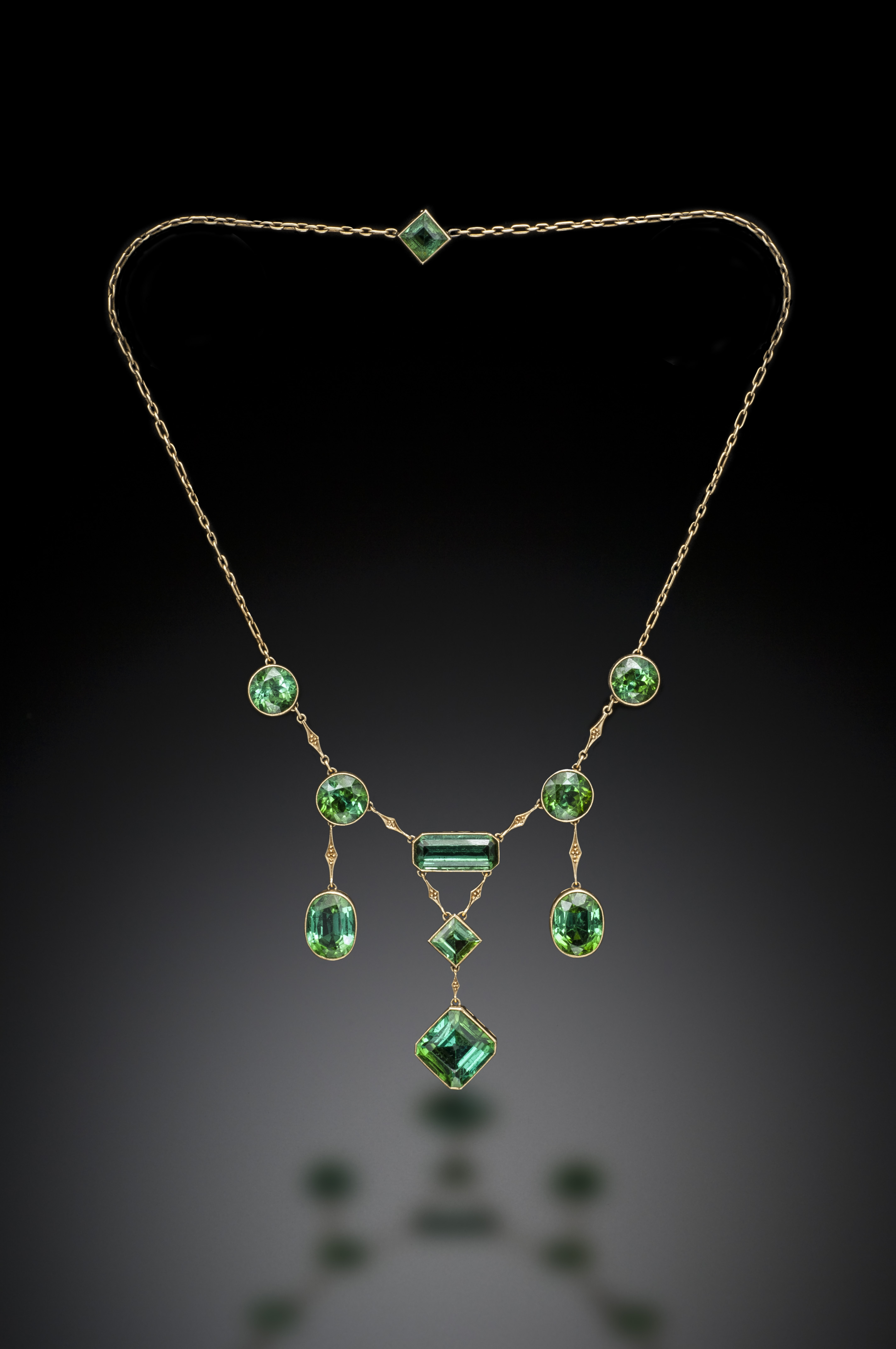 gold necklace with green tourmaline