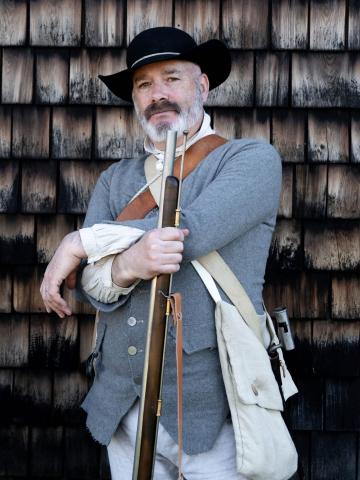 man in period dress