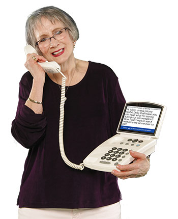Photograph of woman using CapTel service